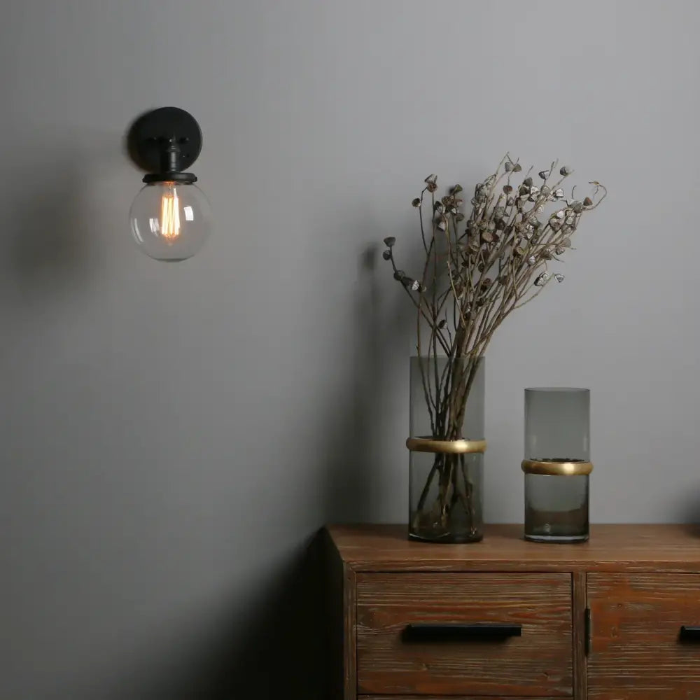 Black Glass Wall Sconce with Chrome Accent Canopy