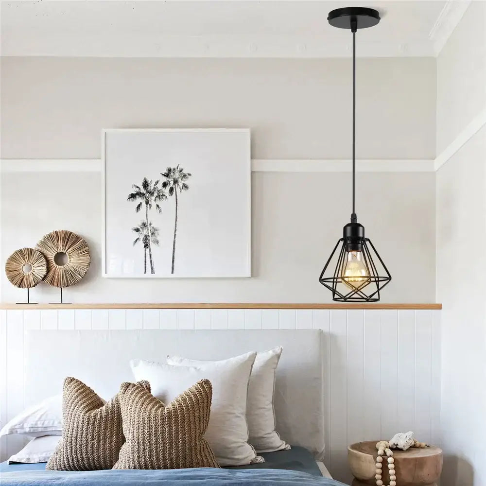 Black Metal Cage Pendant for Compact Dining Space
