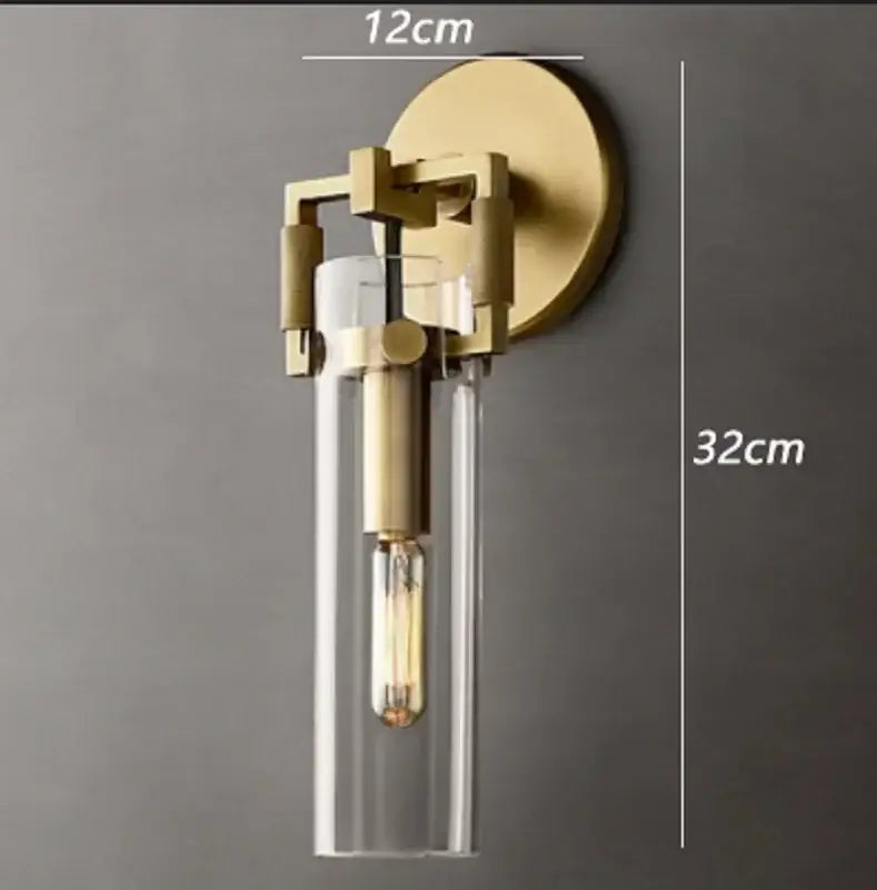 Gold Glass Wall Sconce with Clear Shade Design