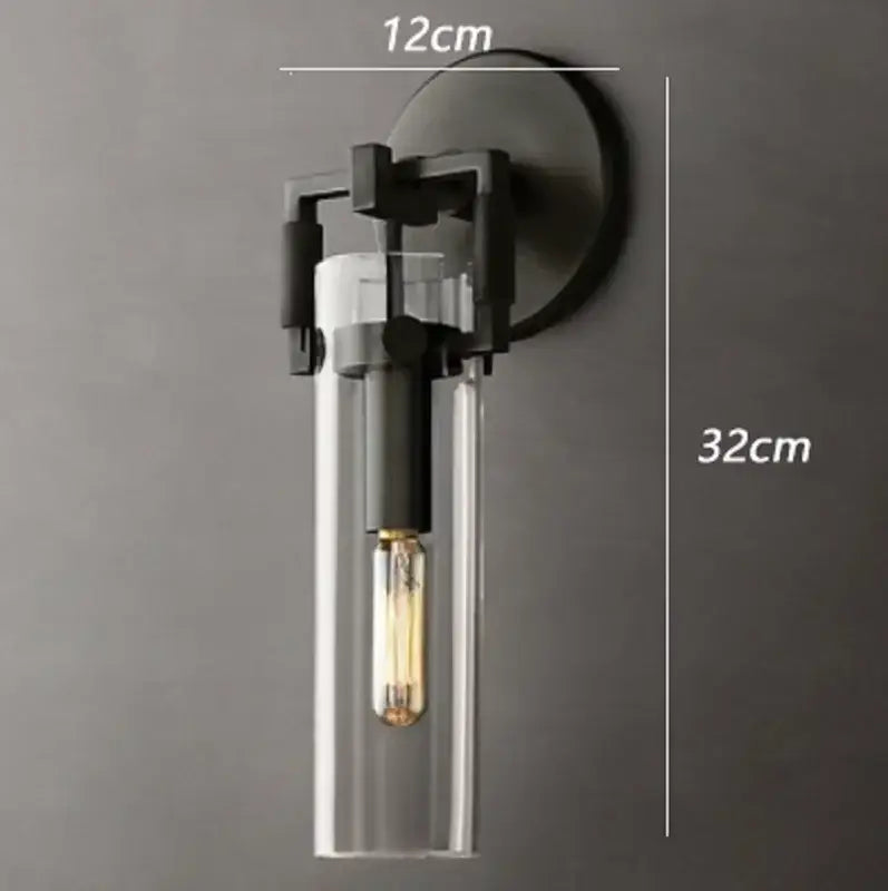 Gold Glass Wall Sconce with Clear Shade Design