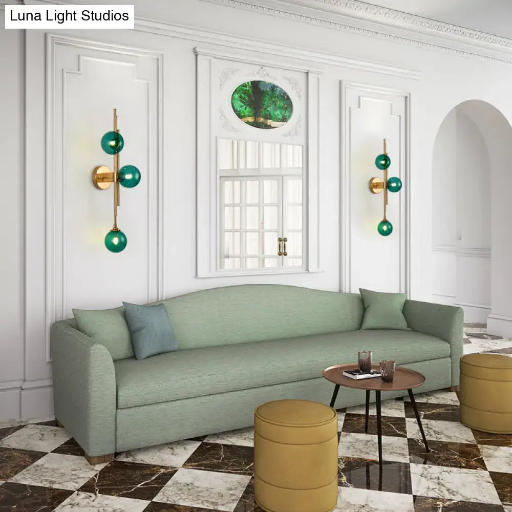 Brass Glass Orb Sconce