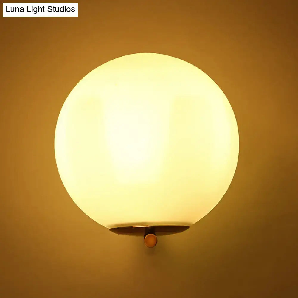 Gold Frosted Glass Ball Compact Sconce
