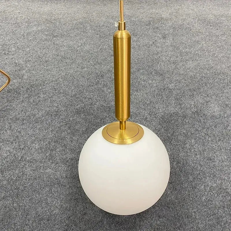 Gold Glass Ball Pendant Brass or Black Wire