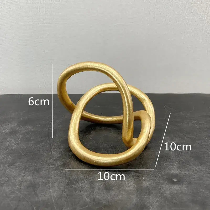 Gold Ring Knot Sculpture