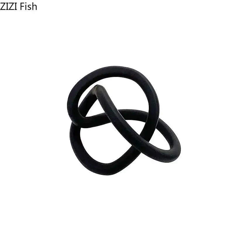 Gold Ring Knot Sculpture