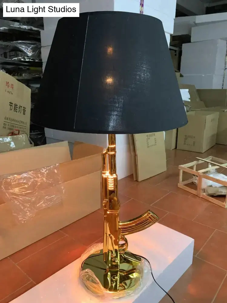Gold Black Gun Floor Lamp