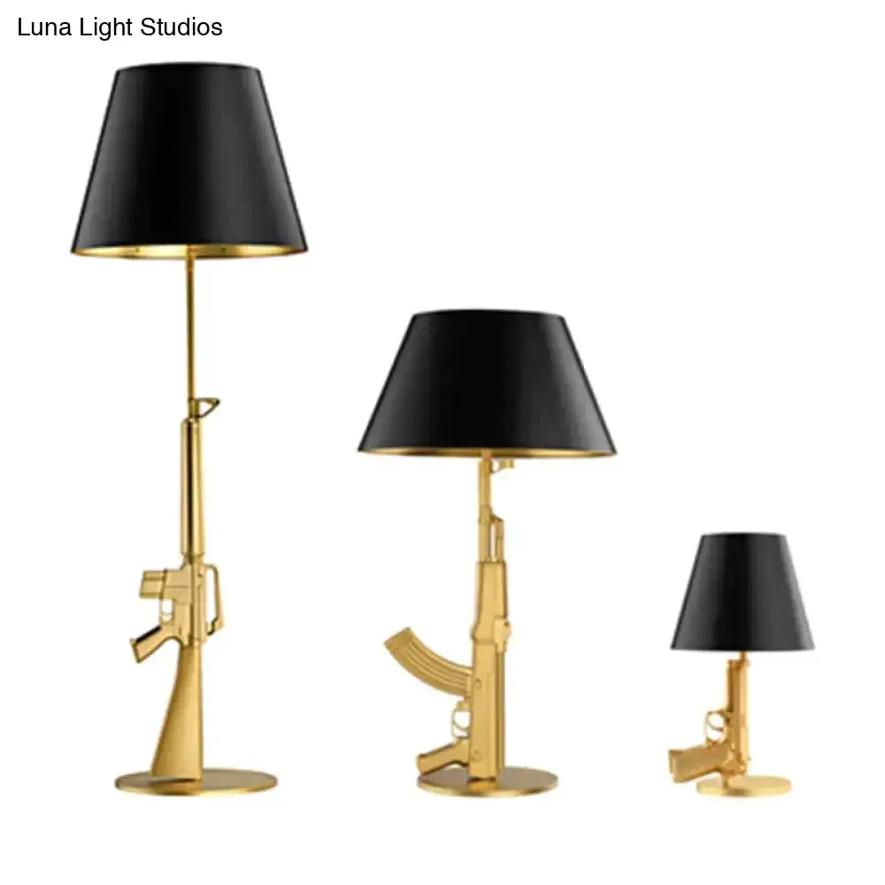 Gold Black Gun Floor Lamp