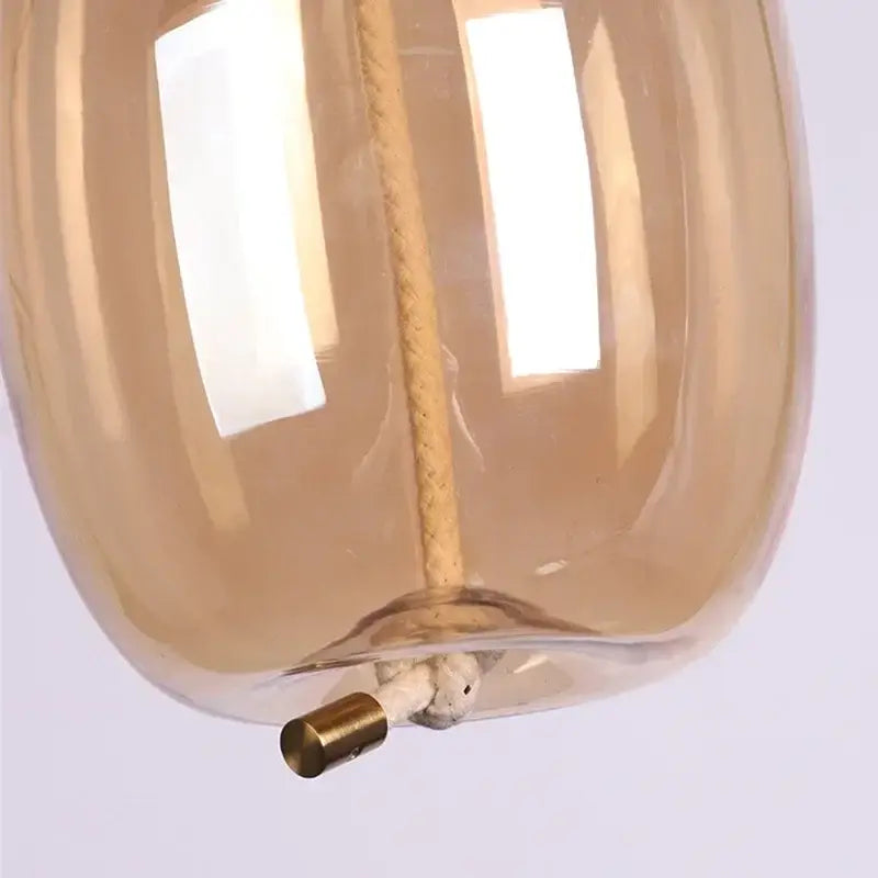 Amber Glass Pendant Light with Gold Accents