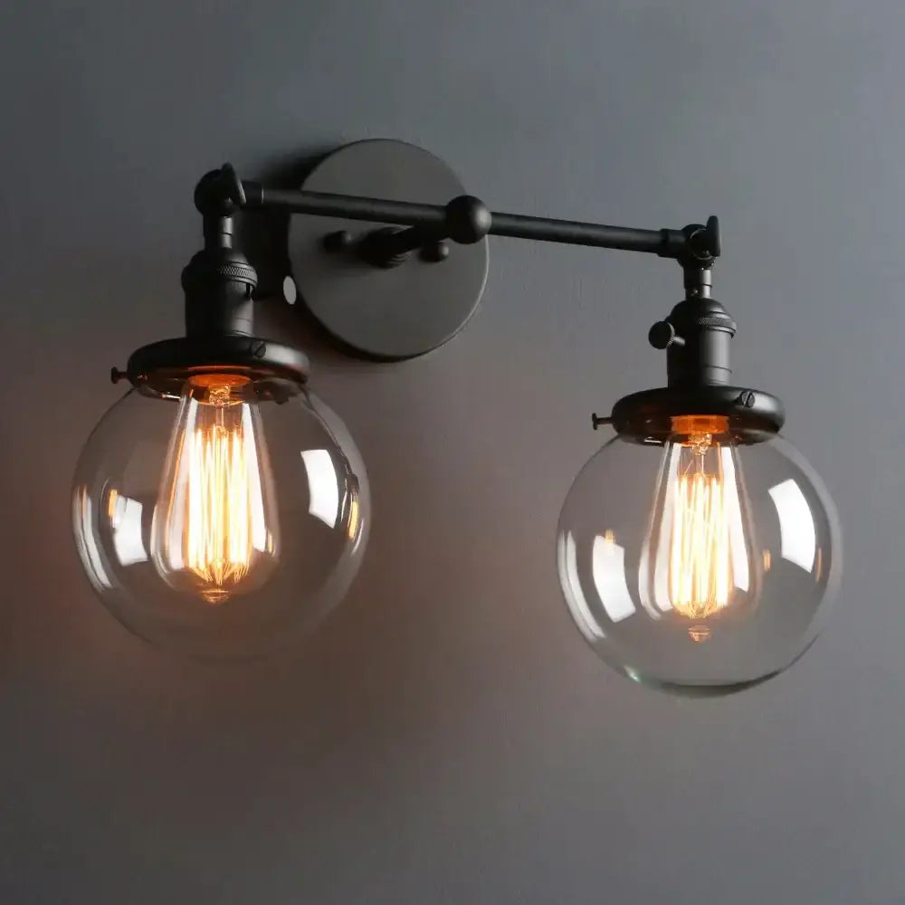 Black Globe Wall Sconce With Antique Finish