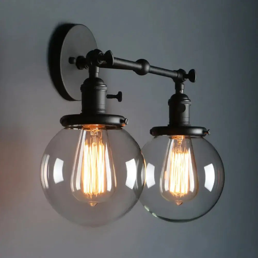 Black Globe Wall Sconce With Antique Finish