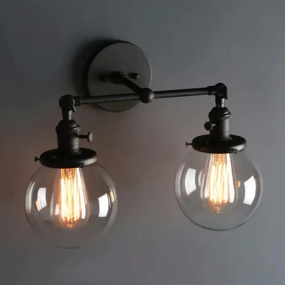 Black Globe Wall Sconce With Antique Finish