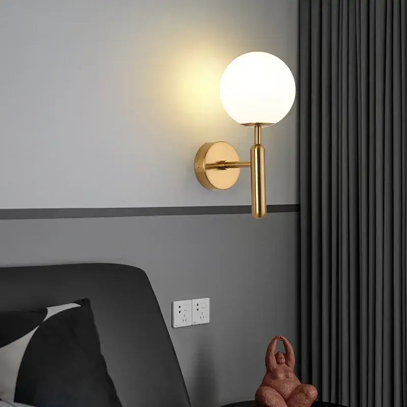 Gold Teardrop Wall Sconce with Glass Globe Shade