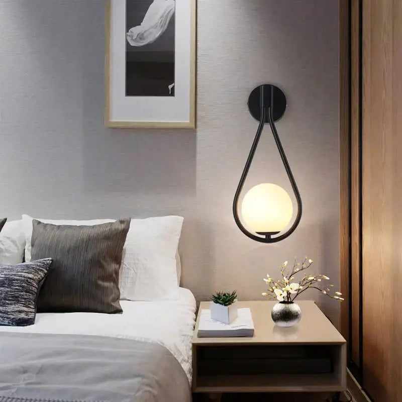 Gold Teardrop Wall Sconce with Glass Globe Shade