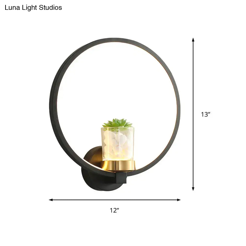 Black Circular Wall Sconce with Plant Vase