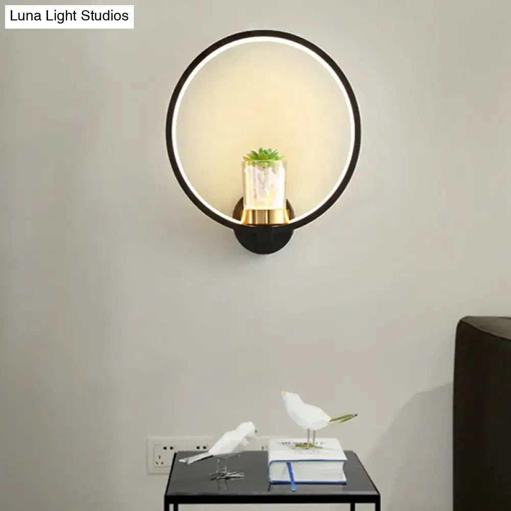 Black Circular Wall Sconce with Plant Vase