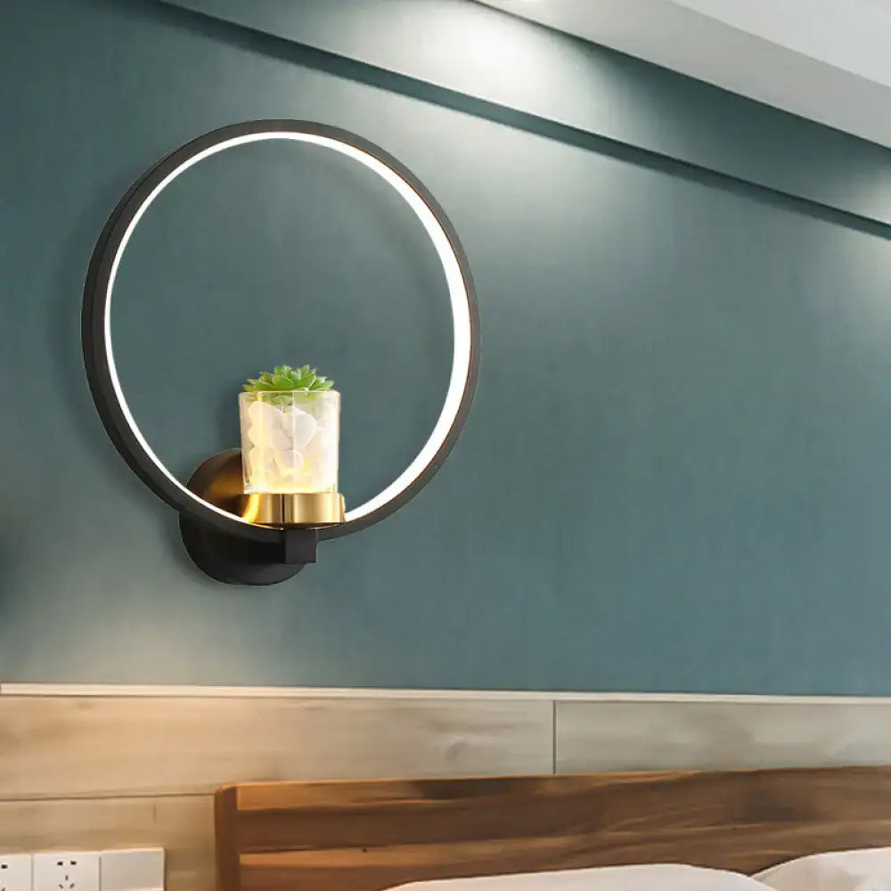 Black Circular Wall Sconce with Plant Vase