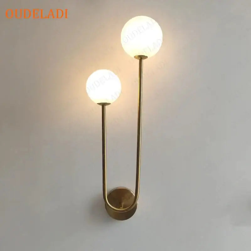 Brass LED Wall Sconce with Dual Adjustable Bulbs