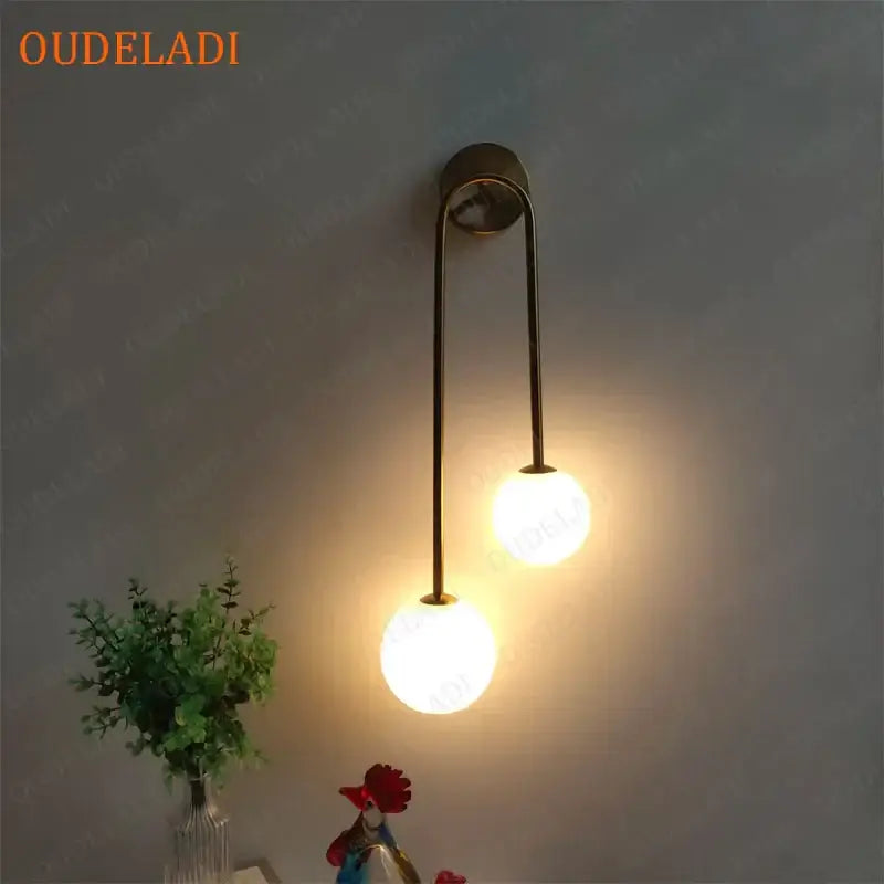 Brass LED Wall Sconce with Dual Adjustable Bulbs