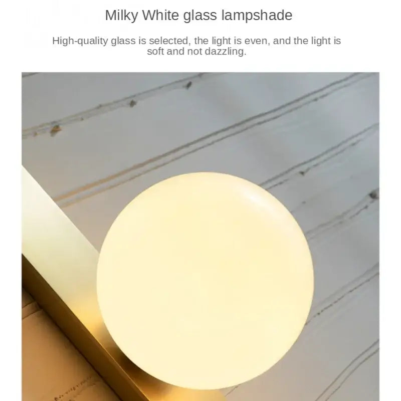 Gold Minimalist Wall Sconce with Clean Lines