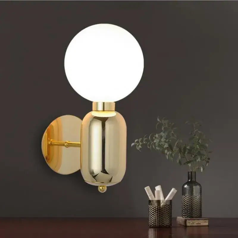 Gold Mirror Ball Sconce