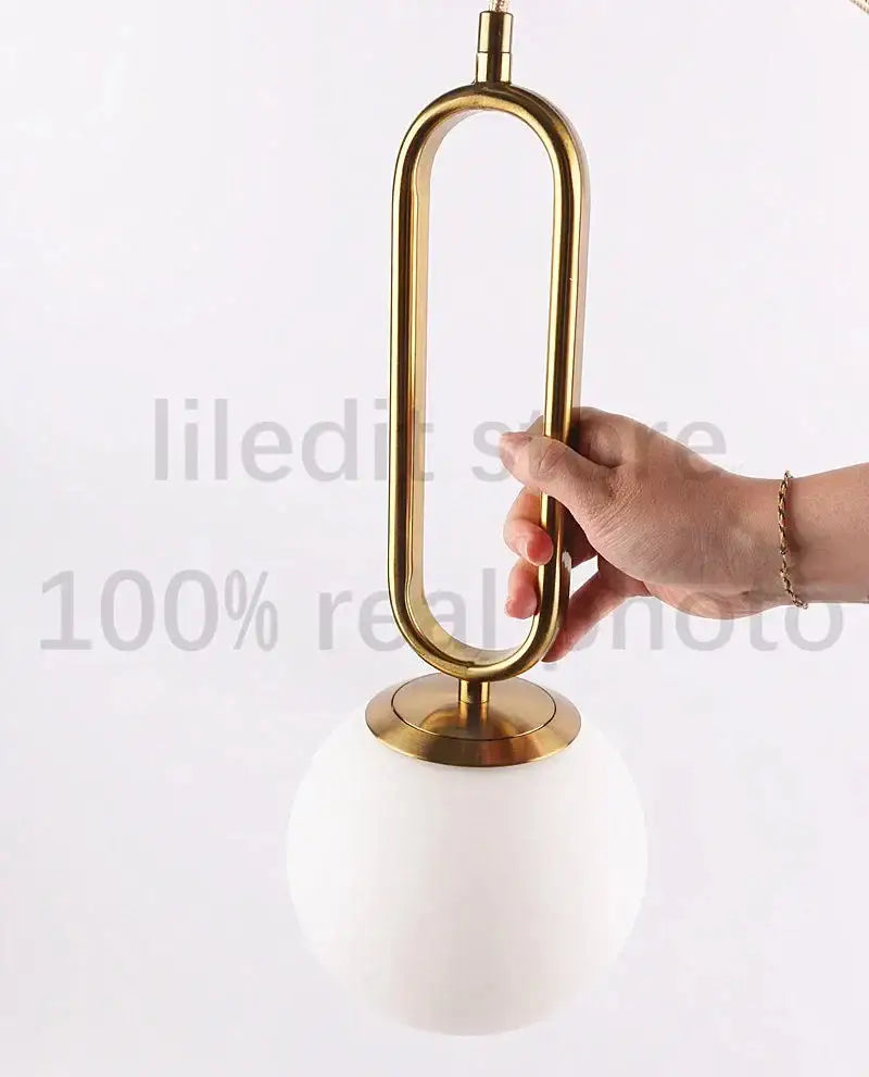 Gold Glass Ball Pendant with Oval Frame for Kitchens