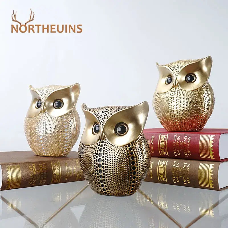 Gold Perforated Owl Statues