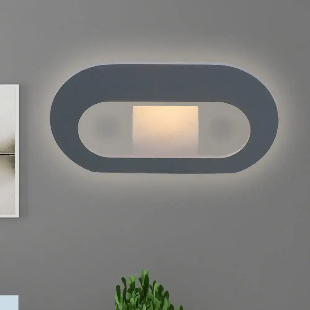 Black Oval Metal Reading-Nook Wall Lamp