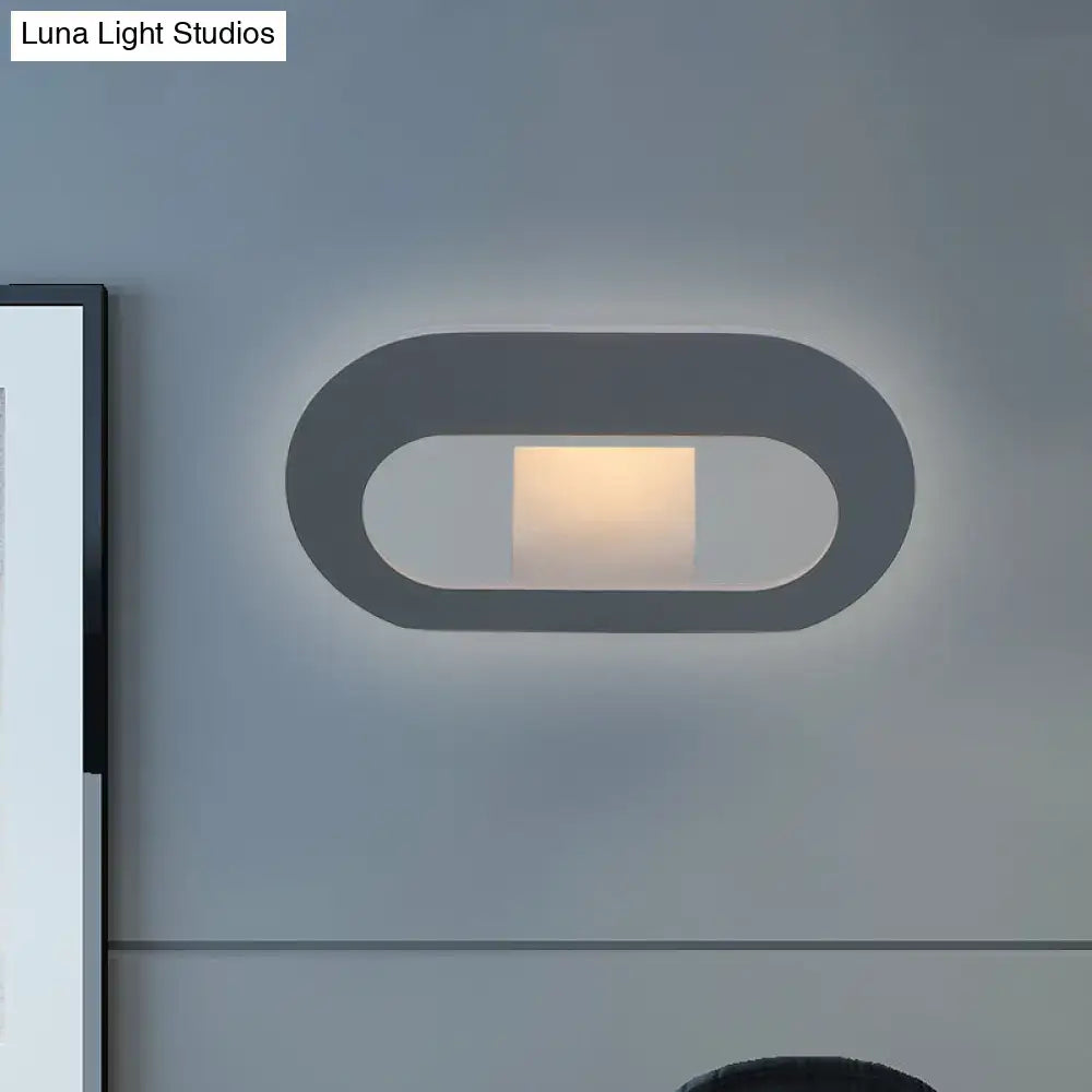 Black Oval Metal Reading-Nook Wall Lamp