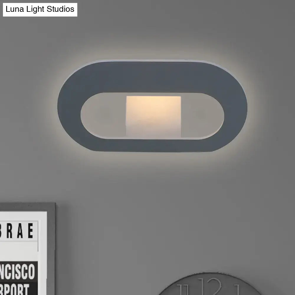 Black Oval Metal Reading-Nook Wall Lamp