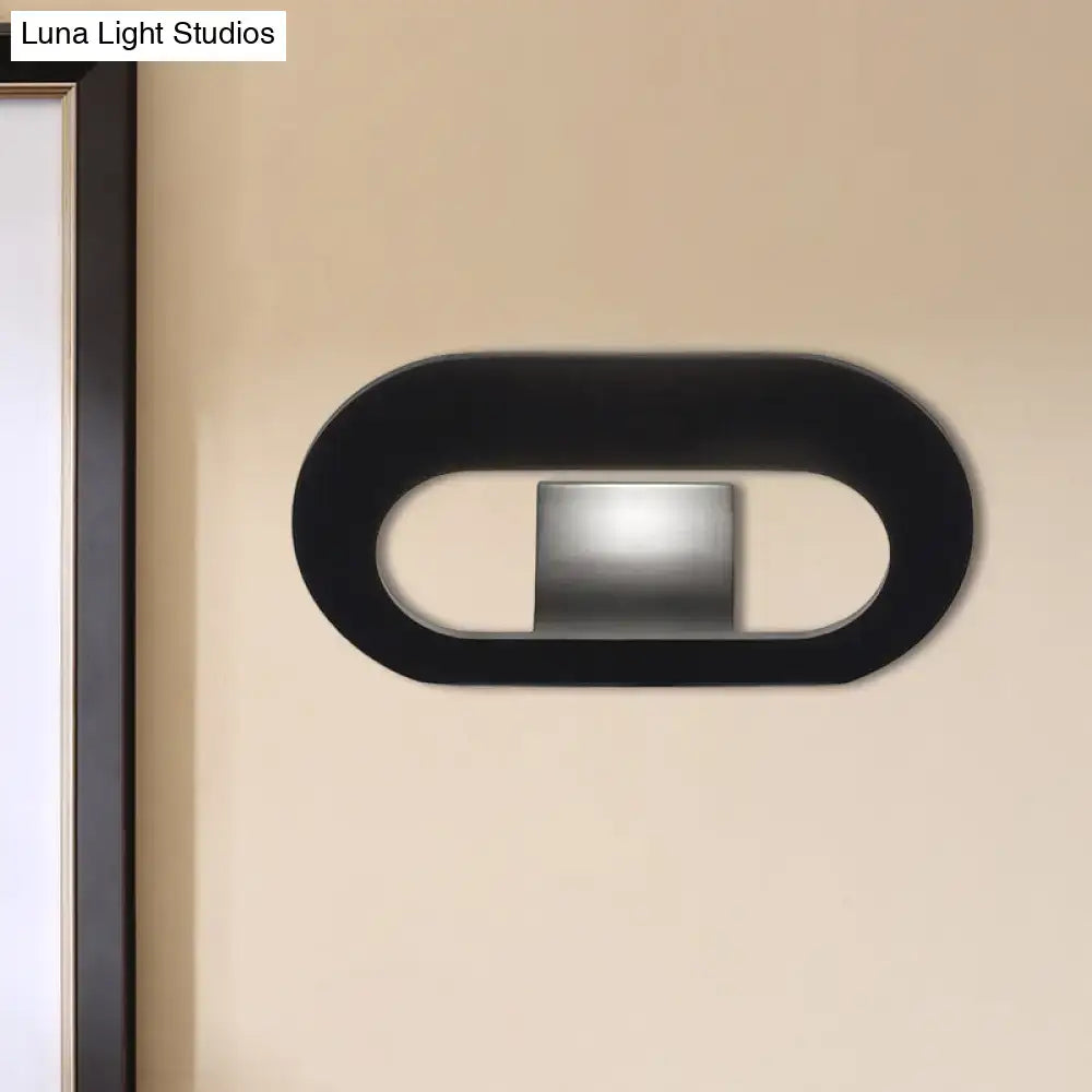 Black Oval Metal Reading-Nook Wall Lamp