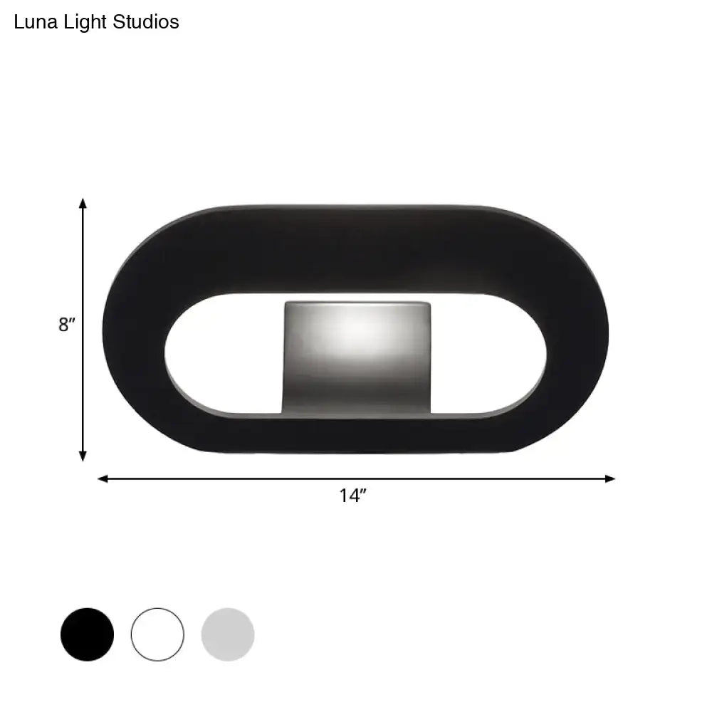 Black Oval Metal Reading-Nook Wall Lamp