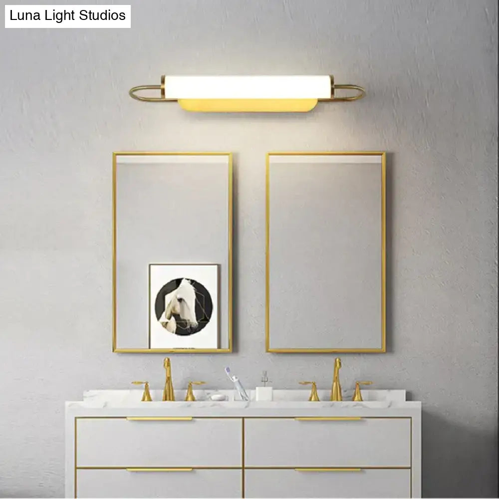 Gold Cylindrical Up-Down Bedroom Sconce