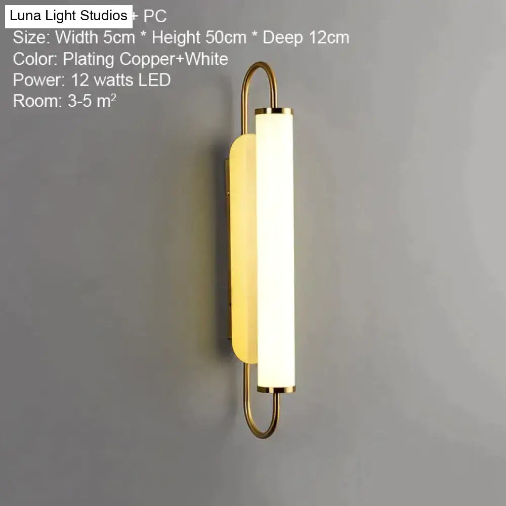 Gold Cylindrical Up-Down Bedroom Sconce