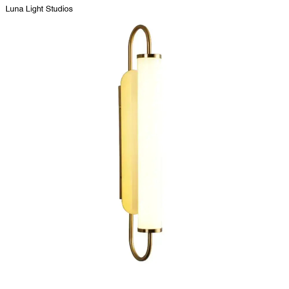 Gold Cylindrical Up-Down Bedroom Sconce