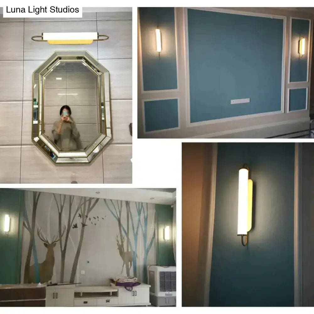 Gold Cylindrical Up-Down Bedroom Sconce