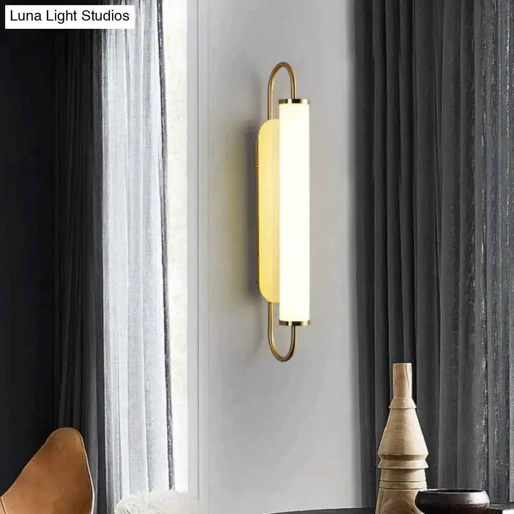 Gold Cylindrical Up-Down Bedroom Sconce