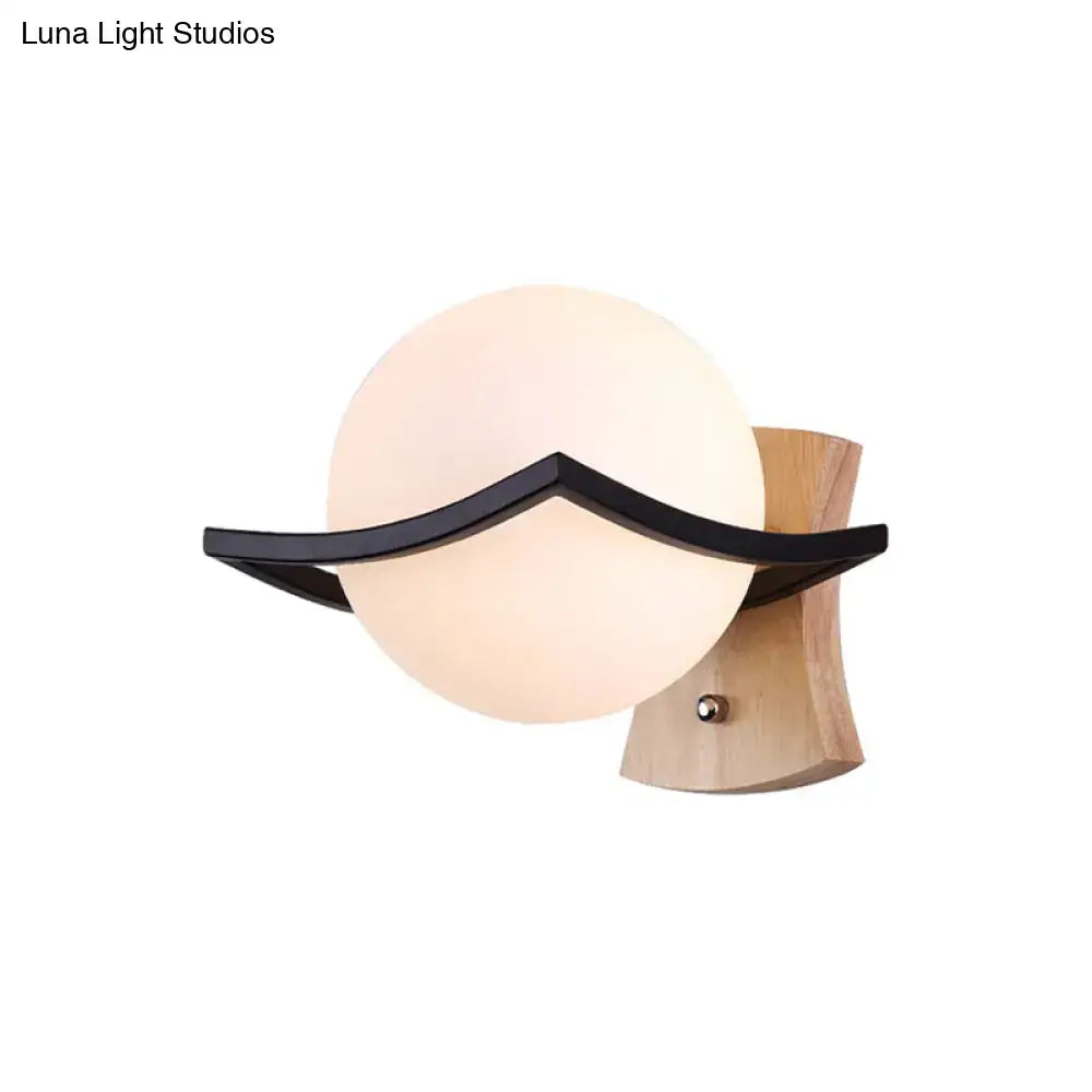 White Glass Ball Black-Accent Sconce
