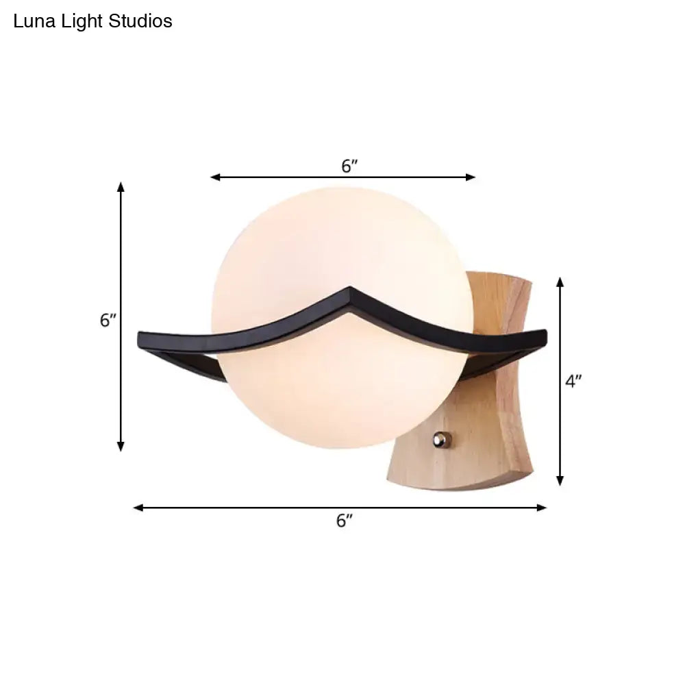 White Glass Ball Black-Accent Sconce