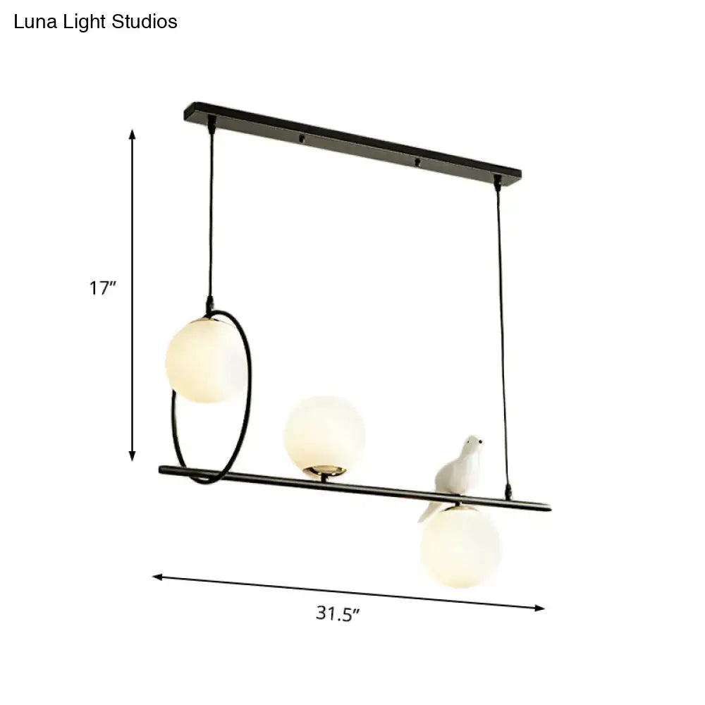 Black Milk Glass Bird Three-Light Pendant