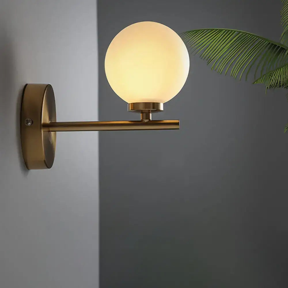 Brass Globe Compact Wall Sconce