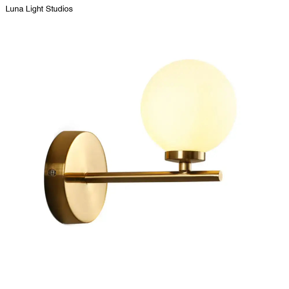 Brass Globe Compact Wall Sconce