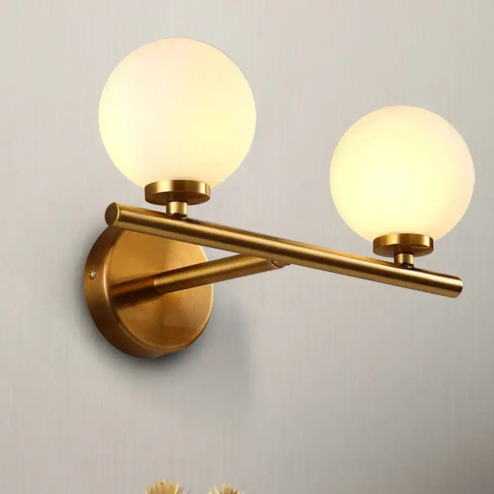 Brass Globe Compact Wall Sconce