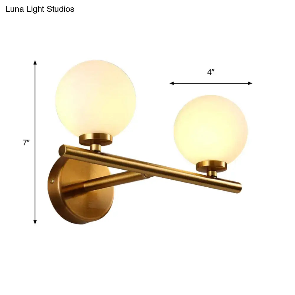 Brass Globe Compact Wall Sconce