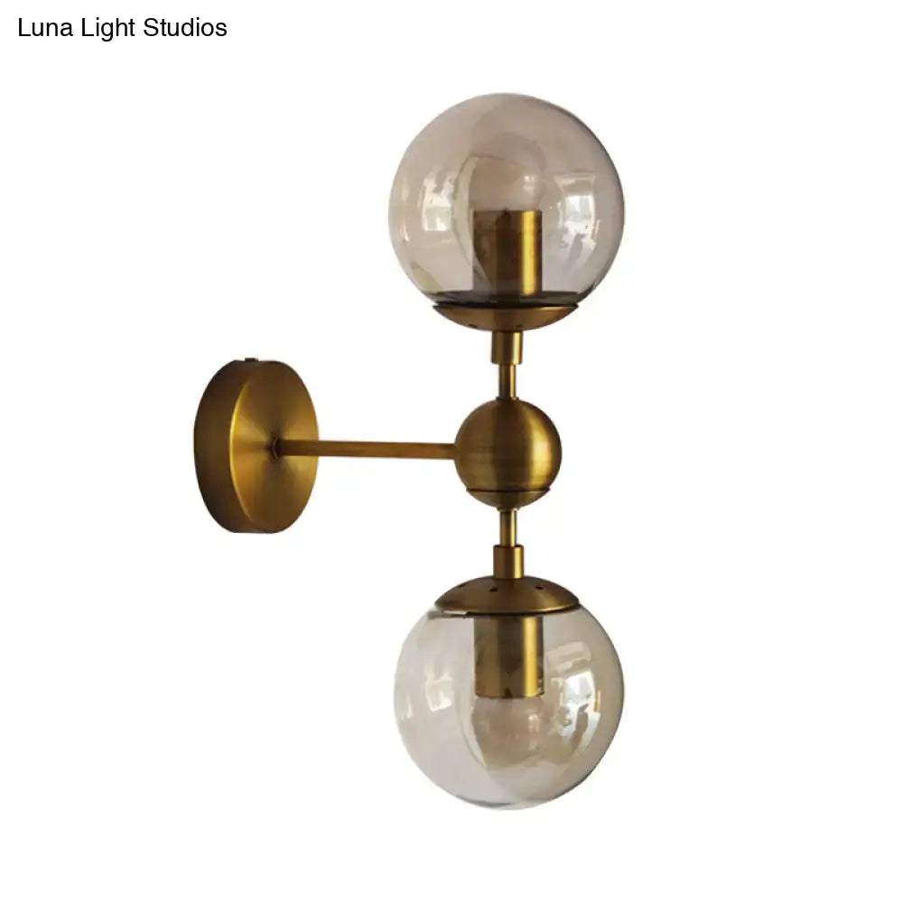 Brass Amber Globe Sconce