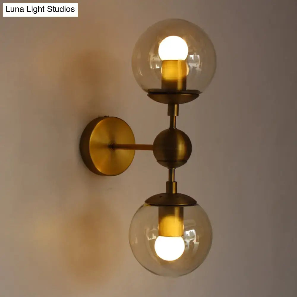 Brass Amber Globe Sconce