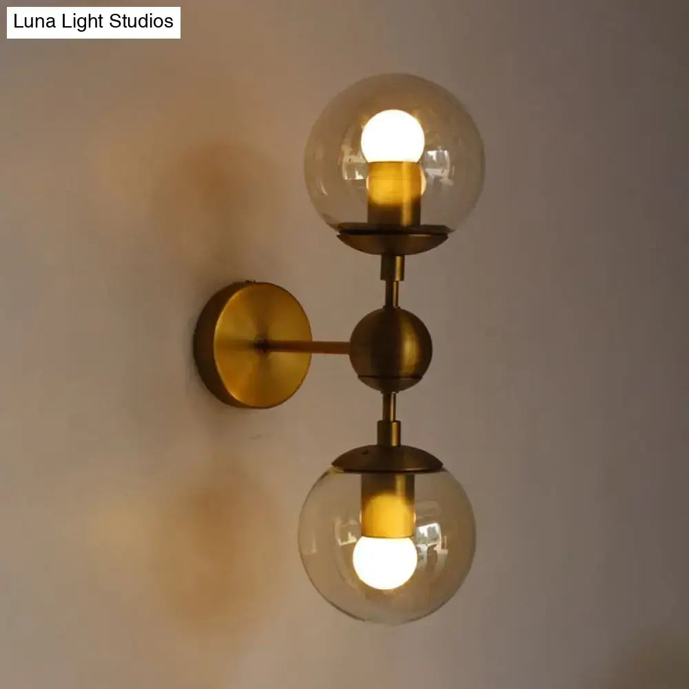 Brass Amber Globe Sconce