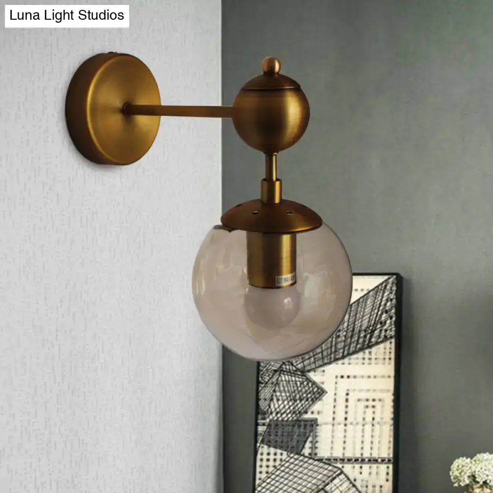 Brass Amber Globe Sconce