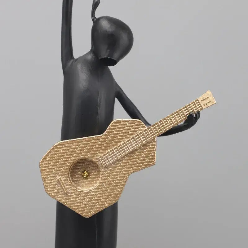 Black Gold Guitarist Sculpture