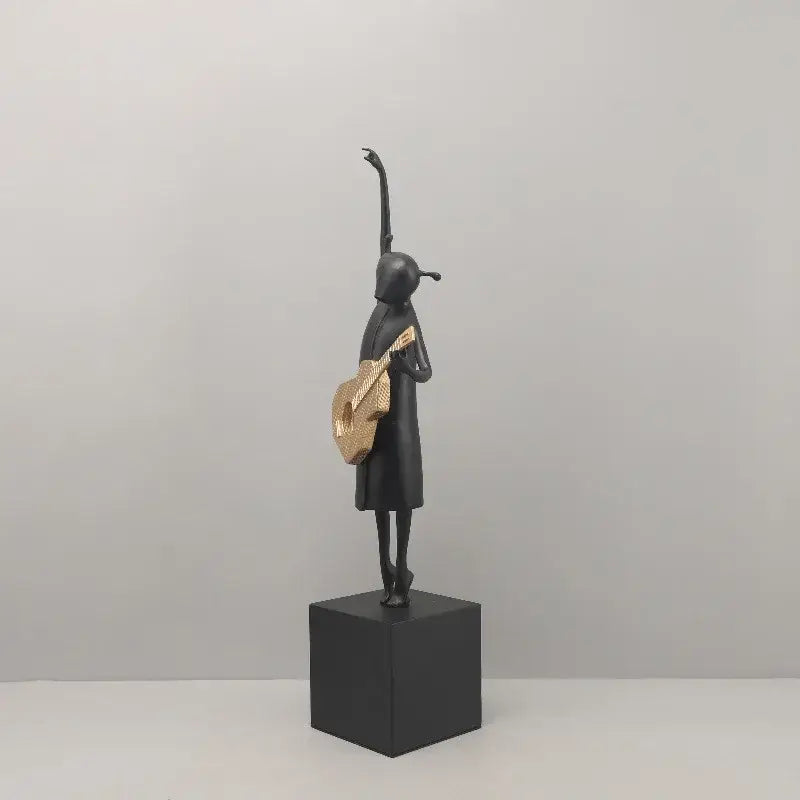 Black Gold Guitarist Sculpture