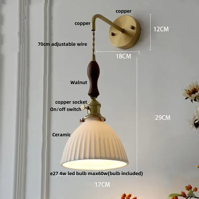 Vintage brass wall light with ribbed glass and knob switch bedroom